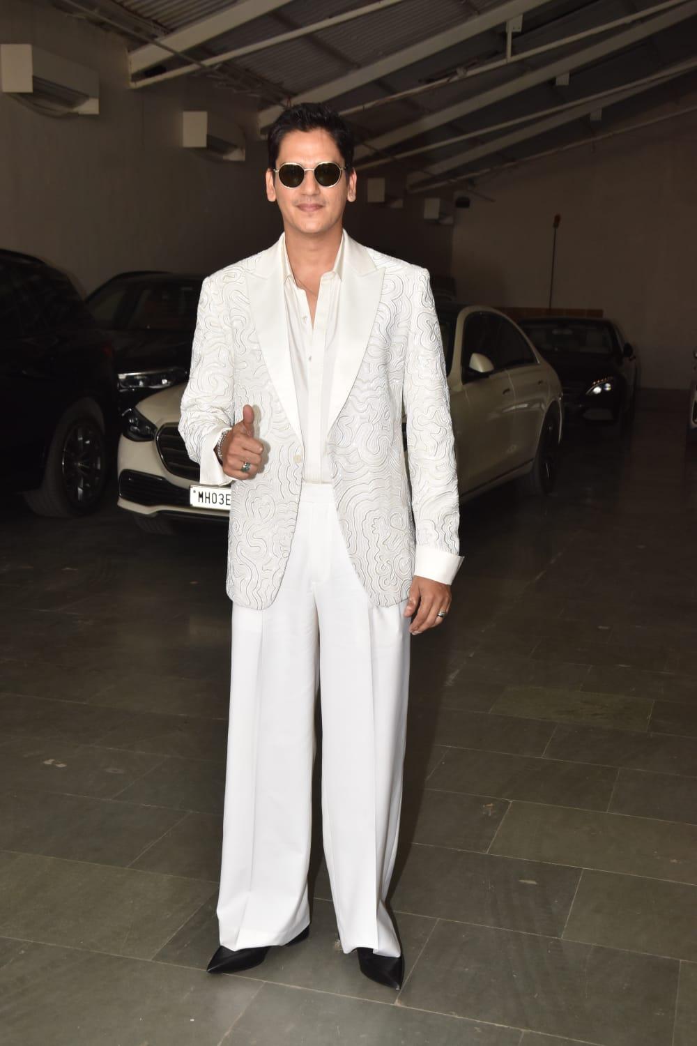 Vijay Varma, another versatile actor, opted for a classic white suit, perfectly balancing sophistication and style.